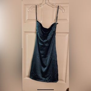 one small and one medium green slip dress